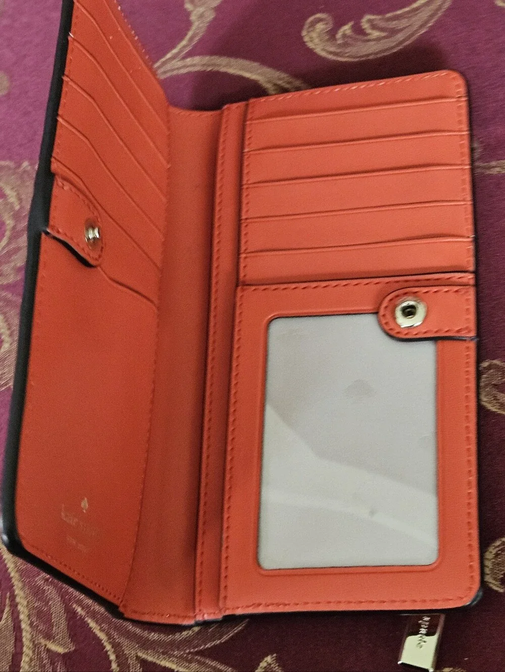 Kate Spade New York coral orange Saffiano leather continental wallet